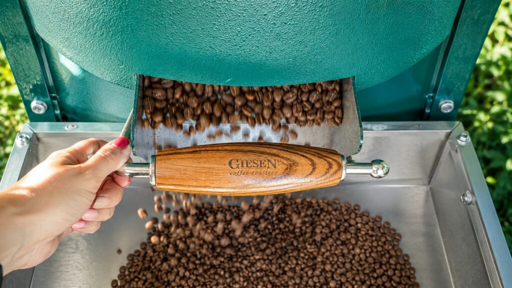 Fresh coffee beans being roasted to perfection in a specialty coffee roastery.