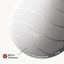 Close-up of AeroPress Stainless Steel Filter Standard, featuring a durable reusable metal design for coffee brewing.